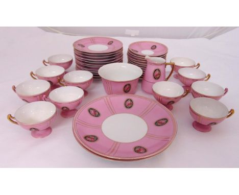 A continental teaset to include cups, saucers, plates and a cake plate, beehive mark to the base (39)