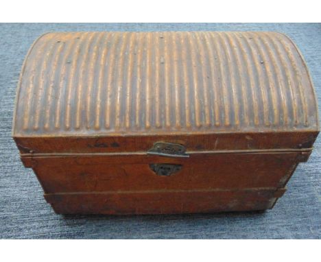 A metal arched top steamer trunk with ribbed hinged cover and labels to inside, 54 x 77 x 51cm, A/F