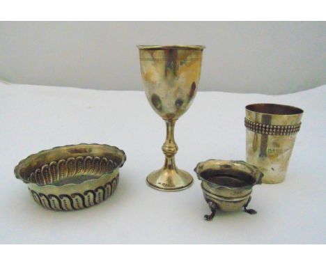 A quantity of hallmarked silver and white metal to include a Kiddush cup, a beaker, a Victorian sugar bowl and a salt, approx