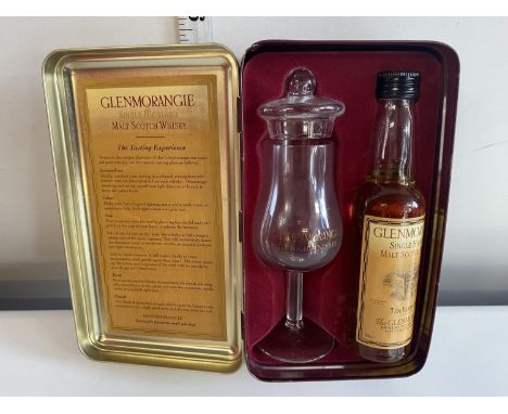 A cased bottle of Glenmorangie single malt whiskey in presentation tin 10cl 