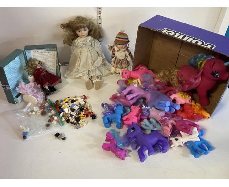 A selection of assorted dolls and figurines including My Little Ponies and Lego style figures etc 