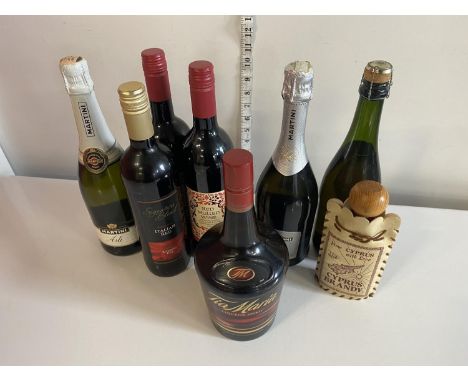 A selection of assorted alcohol including Tia Maria, Red Wine etc, shipping unavailable