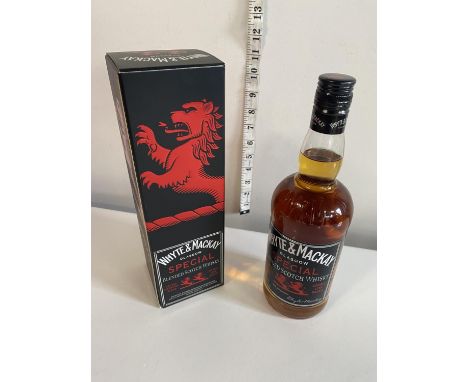 A sealed bottle of Whyte and Mackay Scotch Whiskey 70cl 