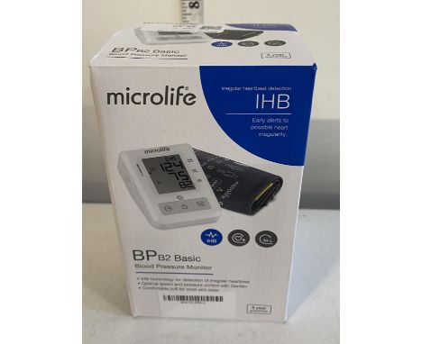A boxed digital blood pressure monitor 