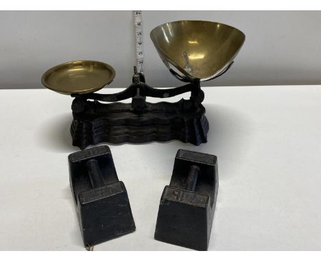 A pair of antique weighing scales and two 7lb weights, shipping unavailable