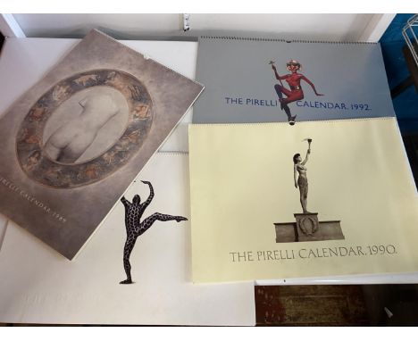 Four collectible Pirelli calendars from late 80's/90's 