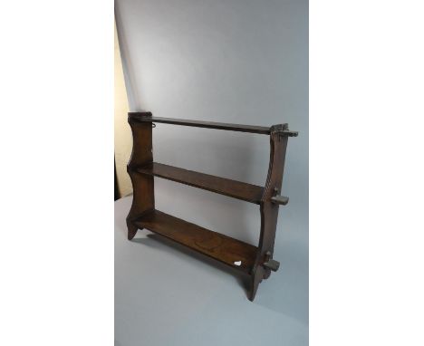 An Edwardian Three Tier Wall Shelf, 65cm Wide 