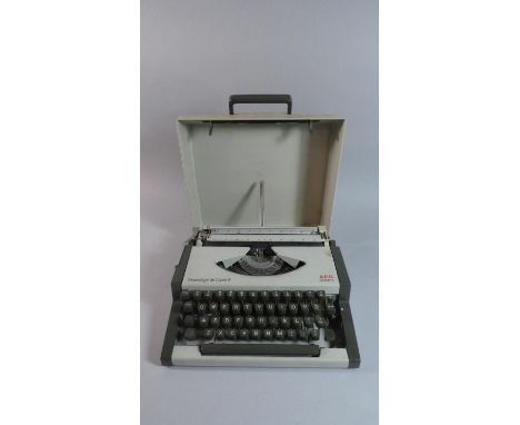 A Vintage AEG Olympia Traveler Deluxe S Manual Portable Typewriter 