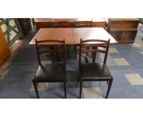 A 1970's Dining Room Suite Comprising Extending Table and Four Ladder Back Chairs 