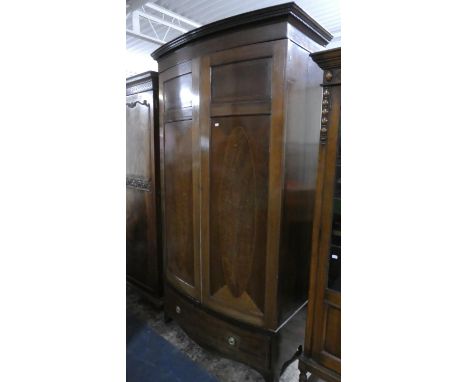 An Edwardian Inlaid Mahogany Bow Fronted Double Wardrobe with Base Drawer and Dentil Cornice, 140cm Wide 