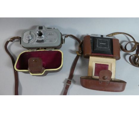 A Vintage Zeiss Ikon Movinette 8D Cine Camera in Leather Case Together with Zeiss Ikon Vintage Nettar Camera with Prontor SVF