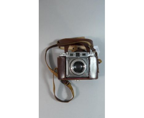 A Vintage Leather Cased Braun Gloria Camera 