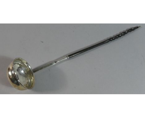 A George IV Silver Toddy Ladle with Inset Coin and Twisted Baleen Handle, 26cm Long 