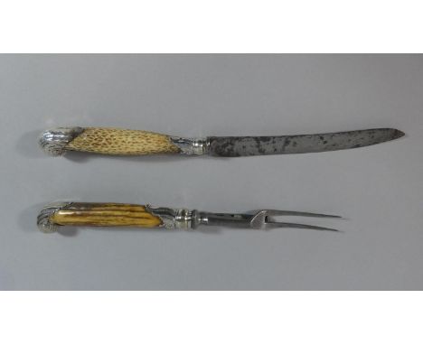 A Silver Mounted Bone Handled Pistol Grip Carving Knife and Fork Set, Sheffield Hallmark 
