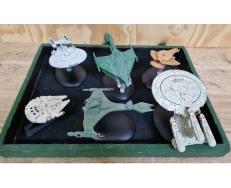 A group of 6 assorted model starships comrising of 1 star wars &amp; 5 Star Trek.  