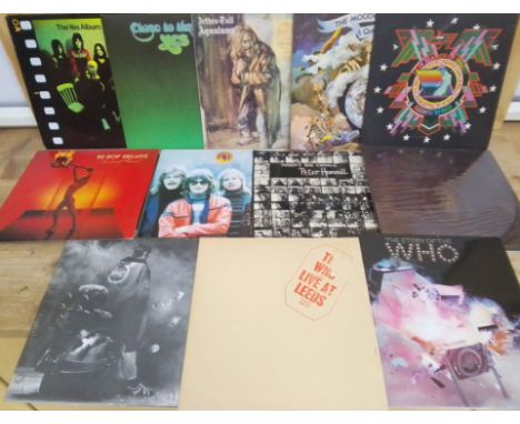 Twelve assorted LPs including The Who, Yes, Be-Bop Deluxe, Hawkwind etc. Condition- the Hawkwind album has a fold out sleeve 