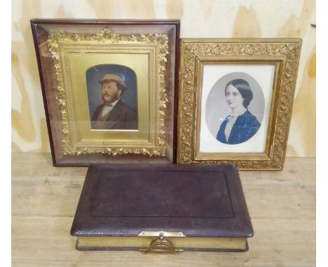 A Victorian photograph album, a framed portrait depicting a gentleman and another.  