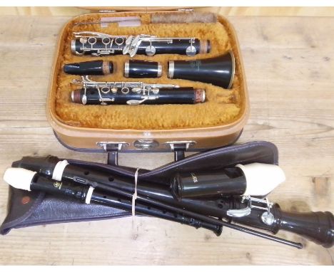 A Lafleur clarinet in case together with two recorders.  