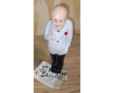 A novelty plaster model depicting "Smoking Churchill".  