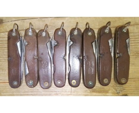 Eight Amefa KL Dutch army penknives.