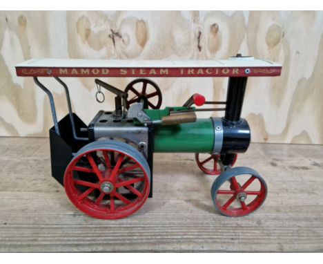 A Mamod steam tractor, 24cm length.  