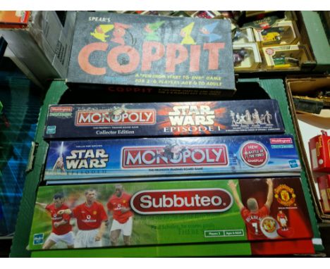 A box of games comprising 2 x Star Wars Monopoly (episode I &amp; episode II), Manchester Unted Subbuteo (unused) and a vinta