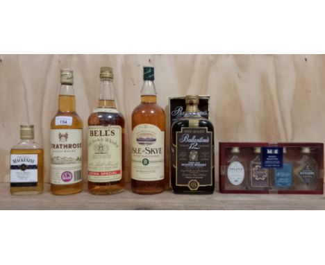 A mixed lot of whisky comprising Ballentine's 12 year old Scotch whisky, Bell's Scotch whisky 1L, Ian Macleod's 8 year old Is
