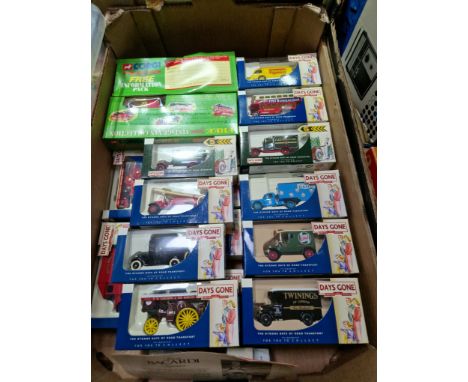 A box of die cast model vehicles, mostly Lledo Days Gone.  