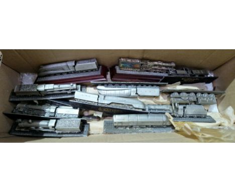 A box of cast metal model trains, mostly Royal Hampshire.  