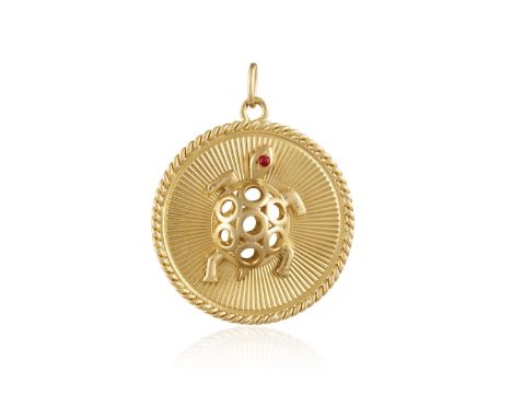 A RUBY PENDANT/CHARM, CIRCA 1965 The circular pendant/charm depicting a central openwork bombé turtle accented with ruby cabo