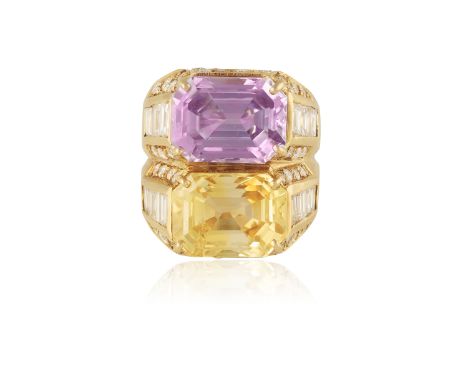 A COLOURED SAPPHIRE AND DIAMOND DRESS RING Composed of an elongated octagonal-shaped pink sapphire and yellow sapphire within