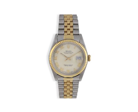 A STAINLESS STEEL AND GOLD CALENDAR BRACELET WATCH, BY ROLEX 31-jewel Cal. 3135 automatic movement, the circular ivory dial w