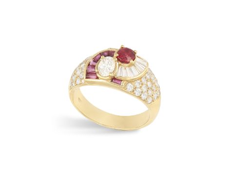 A RUBY AND DIAMOND DRESS RING Composed of a central oval-shaped diamond and ruby within a tapered baguette-cut diamond and ru