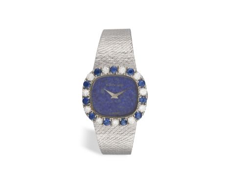 A LADY'S SAPPHIRE, DIAMOND AND LAPIS LAZULI COCKTAIL WRISTWATCH, BY BUECHE-GIROD, CIRCA 1965 The 17-jewels manual wind moveme