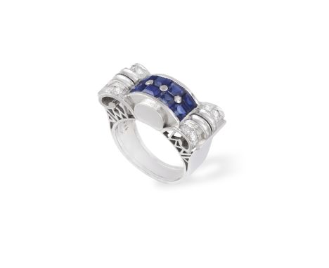 A SAPHIRE AND DIAMOND COCKTAIL RING, CIRCA 1935 Of Odeonesque design, the centre set with calibré-cut synthetic sapphires bet