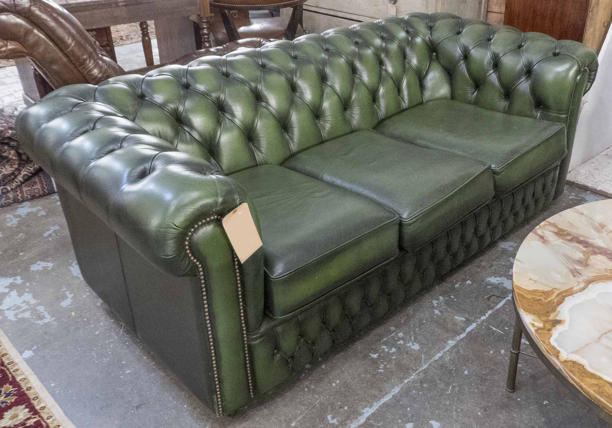 CHESTERFIELD SOFA, three seater, with deep buttoned green leather
