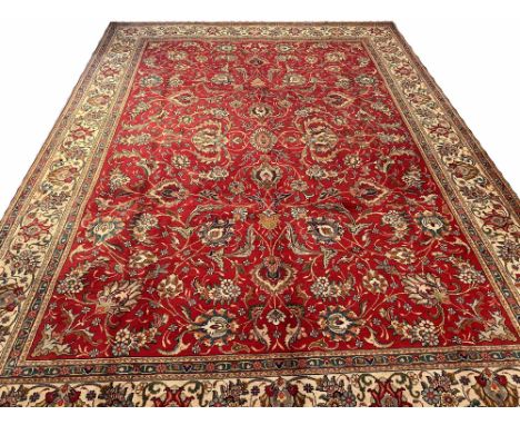 ANTIQUE SHAH ABBAS DESIGN TABRIZ CARPET, 400cm x 295cm, all over palmette and vine design on a ruby field within correspondin