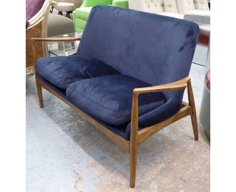 ANDREW MARTIN CRISPIN SOFA, mid century style in midnight blue velvet upholstery with dark wood frame, 130cm L x 82cm H.