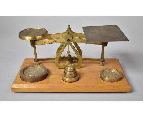 A Set of Brass Postage Scales, with Associated Weights on Rectangular Wooden Plinth, 21.5cm Long 