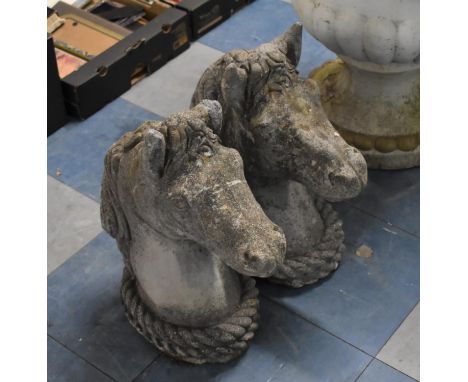 A Near Pair of Reconstituted Stone Gate Post Finials, Horses Heads, Weathered Condition, 47cm high 