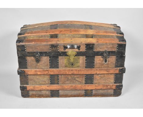 A Vintage Iron and Leather Bond Dome Topped Travelling Trunk, 74cm wide 