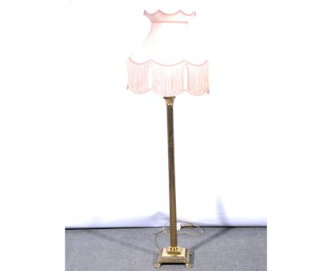 Brass Corinthian column standard lamp, fluted shaft, with shade, 180cm overall.
