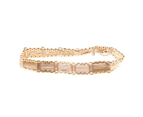 A rose metal gate link bracelet, 10mm wide, six long bar links to centre bordered by short oval links, fitted with a box snap