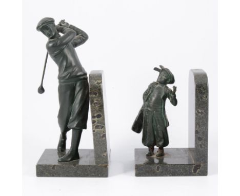 A marble and spelter bookend, designed as a golfer, 26; and a similar bookend designed as a boy golf caddy.