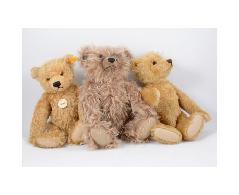 Three Steiff teddy bears, including Classic Teddybar 35 with tags 36cm tall, Grizzly Bear limmited to 2000 with ear button an