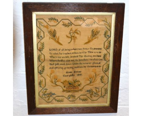 Victorian needlework sampler, by Anne Evans, Caerphilly 1841, with a religious text, mounted and framed, 52cm x 43cm overall.