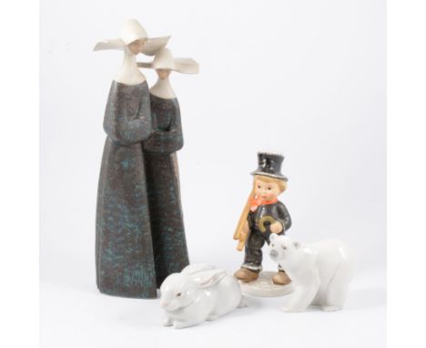 A Lladro stoneware group of two nuns, 35cm; a Lladro Polar Bear and Long-eared Rabbit; and a Hummel figure of a Chimney Sweep