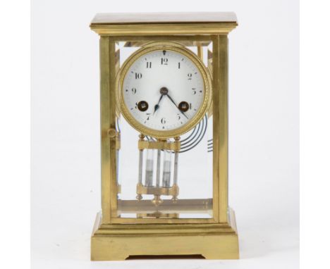 Brass 'four glass' mantel clock, enamel dial, mercury compensated pendulum, French cylinder movement striking on a gong, 22.5