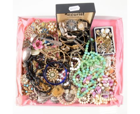 A tray of vintage costume jewellery, paste brooches, bead necklaces, earrings, bracelets and bangle, badges etc.