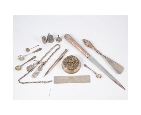 A silver mouted pin wheel, by AJP &amp; Co, Birmingham 1919, 7cms, weighted, a Sterling mounted cigar cutter, on a graduating